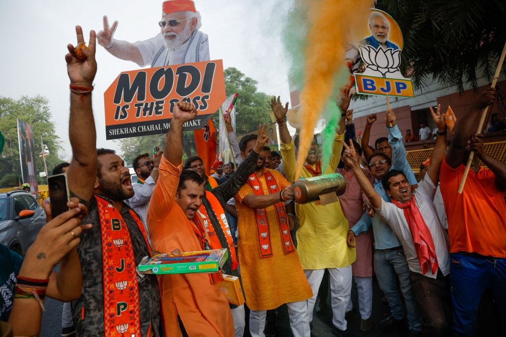 The BJP is leading in 244 of the 543 seats in the directly elected lower house of parliament, according to evening vote count trends, unexpectedly falling short of a majority and raising its reliance on allies to be able to form the next government. — Reuters pic