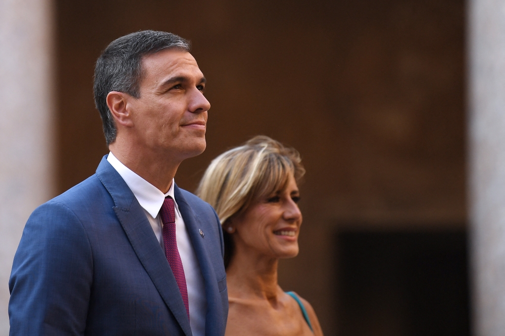 A Spanish court yesterday summoned Prime Minister Pedro Sanchez’s wife , Begona Gomez, to testify as part of a preliminary corruption probe into her business ties in a case the premier dismissed as a set-up. — AFP pic