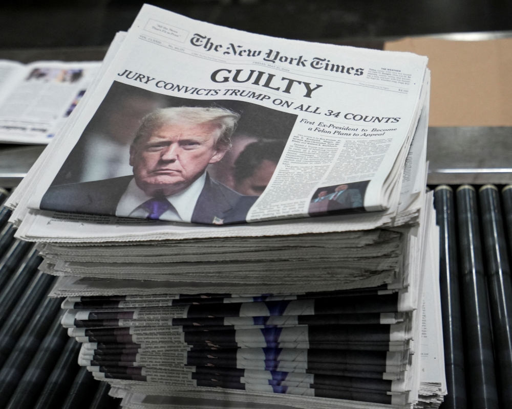 Donald Trump has asked a judge to lift the gag order imposed on him during his New York criminal trial, which saw him become the first convicted former US president, according to a filing released yesterday. — Reuters pic