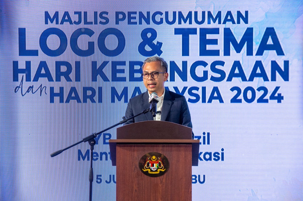 Communications Minister Fahmi Fadzil speaks during the announcement of the theme and logo for National Day and Malaysia Day (HKHM) 2024 in Putrajaya June 5, 2024. — Picture by Shafwan Zaidon