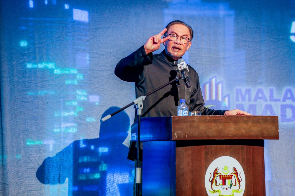 Prime Minister Datuk Seri Anwar Ibrahim delivers his speech at the launch of Malaysia Madani National Training Module at Dewan Seri Siantan in Putrajaya, June 5, 2024. — Picture by Hari Anggara