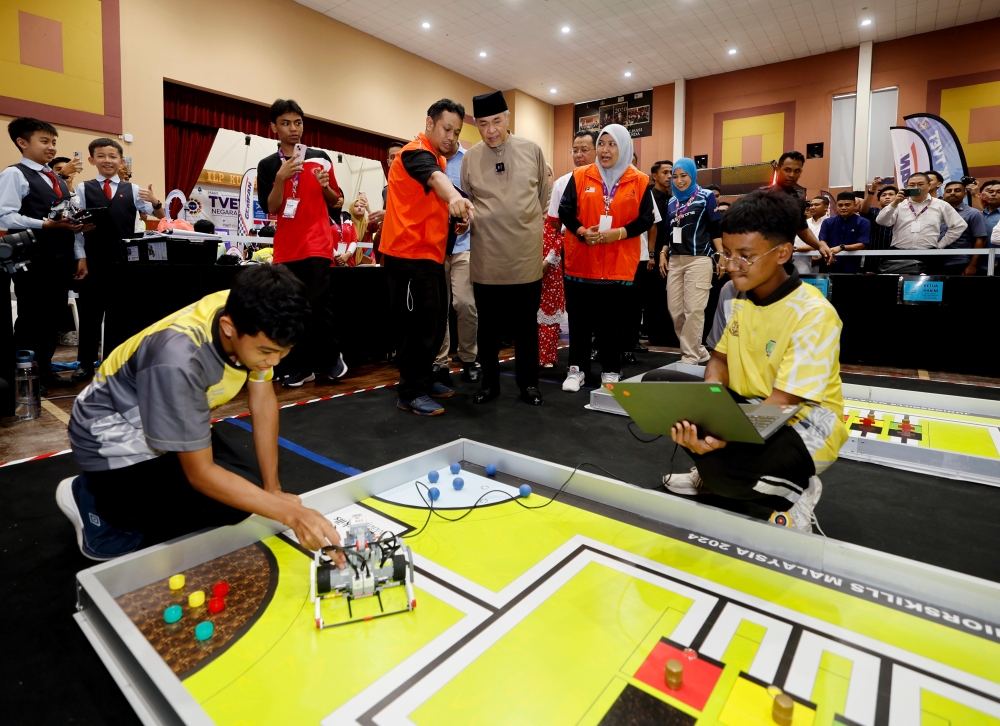Deputy Prime Minister Datuk Seri Ahmad Zahid Hamidi visits the exhibition site in conjunction with the National TVET Day 2024 celebration at the Kuala Langat Industrial Training Institute, June 7, 2024. — Bernama pic 