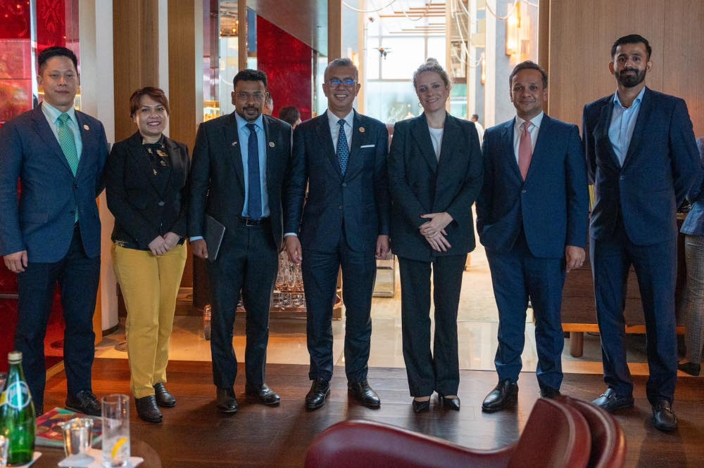 Investment, Trade and Industry Minister Datuk Seri Tengku Zafrul Abdul Aziz with TikTok vice president Helena Lersch (3rd, right) and ministry officials in Singapore, June 7, 2024. — Picture from X/Tengku Zafrul 