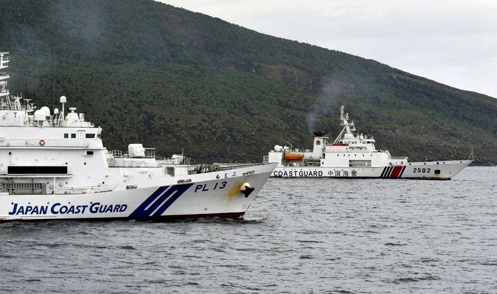 File photo of a China Coast Guard vessel No.2502 sailing near a Japan Coast Guard vessel Motobu off Uotsuri Island, one of a group of disputed islands called Senkaku Islands in Japan, also known in China as Diaoyu Islands, in the East China Sea April 27, 2024, in this photo released by Kyodo. ― Reuters pic