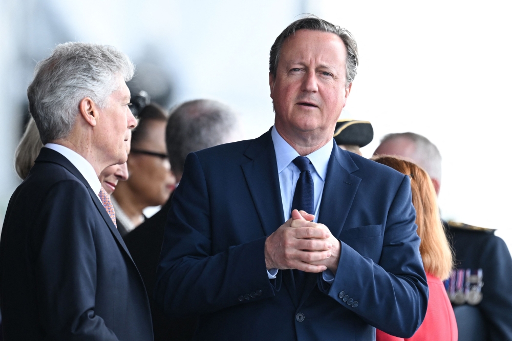 File photo of Britain’s Foreign Secretary David Cameron (right) attends a UK national commemorative event to mark the 80th anniversary commemorations of Allied amphibious landing (D-Day Landings) in France in 1944, in Southsea Common, in Portsmouth, southern England, on June 5, 2024. ― AFP pic
