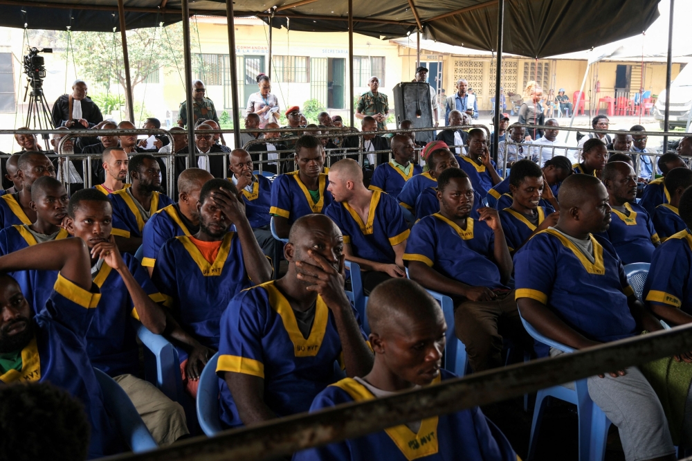 File photo of people suspected to be involved in the attempted coup in Congo wait for the beginning of their trial in Kinshasa, Democratic Republic of Congo June 6, 2024. ― Reuters pic