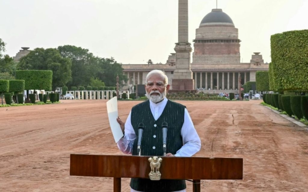 Prime Minister Narendra Modi takes his oath Sunday for a third term but with his BJP reliant on support from an assortment of minor parties after it fell short of a majority. — AFP pic