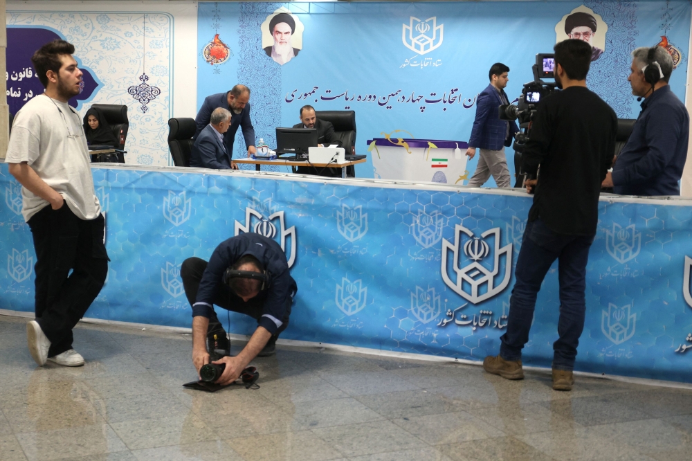 Elections headquarters staff wait to receive candidates to register for Iran's presidential election at the Interior Ministry, in Tehran, Iran June 3, 2024. — Majid Asgaripour/Wana (West Asia News Agency) via Reuters 