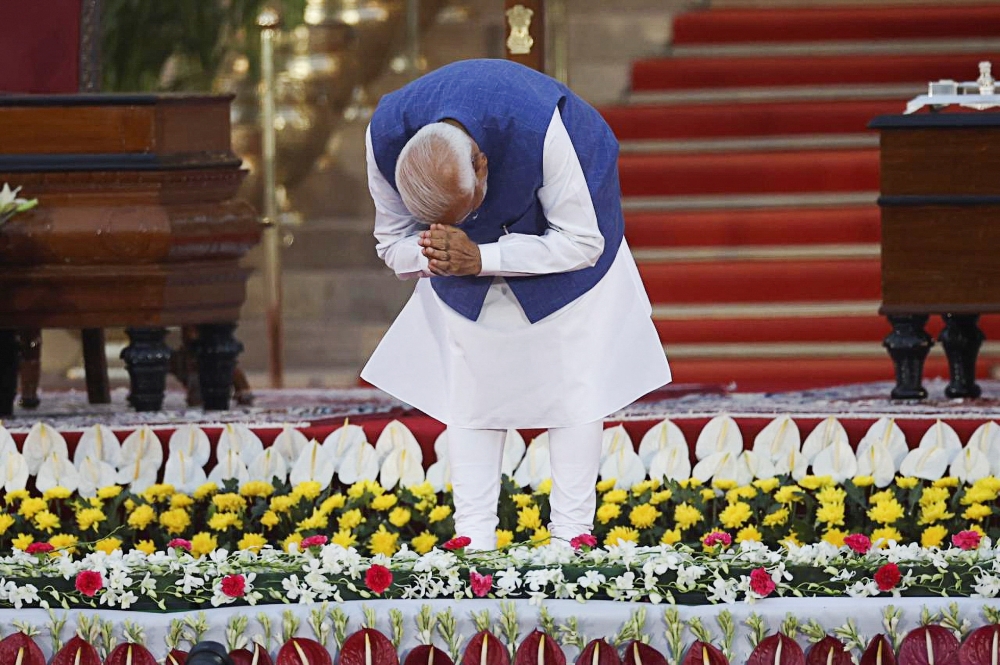 India's Prime Minister Narendra Modi bows during a swearing-in ceremony at the presidential palace in New Delhi June 9, 2024. — Reuters pic  