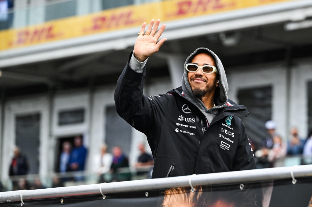 Mercedes driver Lewis Hamilton salutes the crowd during the drivers parade of the Canadien Grand Prix at Circuit Gilles Villeneuve in Montreal June 9, 2024. — Picture by David Kirouac-USA TODAY Sports via Reuters