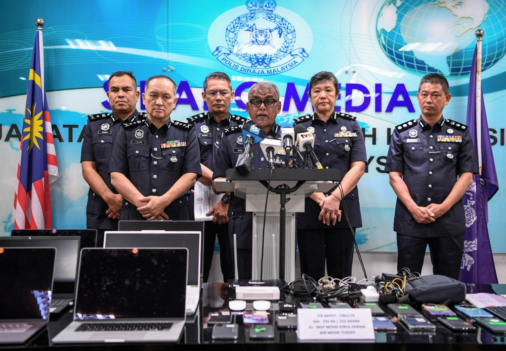 Bukit Aman Commercial Crime Investigation Department director Datuk Seri Ramli Mohamed Yoosuf said all the suspects aged 28 to 42 were arrested through a raid by a team from the Commercial Crime Investigation Department (CCID) on two upscale residences around Jalan Tun Razak at 2.45pm. — Bernama pic  