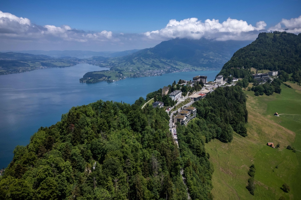 This aerial photograph taken on June 4, 2024, shows the luxury Burgenstock resort above Lake Lucerne, central Switzerland that will host a Ukraine peace summit on June 15-16, 2024. Switzerland has registered an increase in cyberattacks and disinformation in the run-up to a summit this weekend that aims to create a pathway for peace in Ukraine. — AFP pic