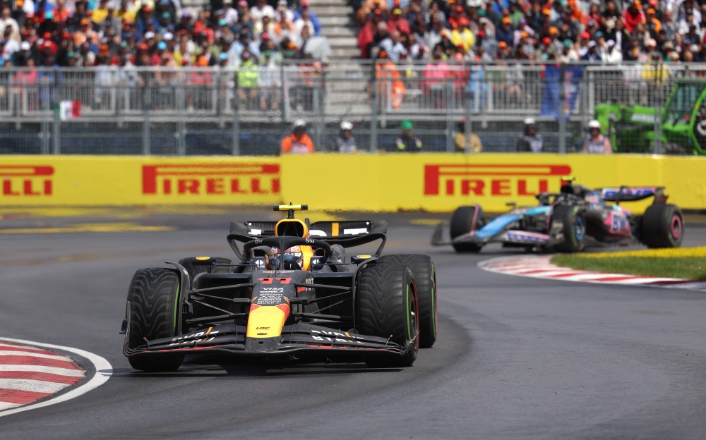 Red Bull Racing’s Mexican driver Sergio Perez races ahead of Alpine’s French driver Pierre Gasly during the 2024 Canada Formula One Grand Prix at Circuit Gilles-Villeneuve in Montreal, Canada, on June 9, 2024. — AFP pic 