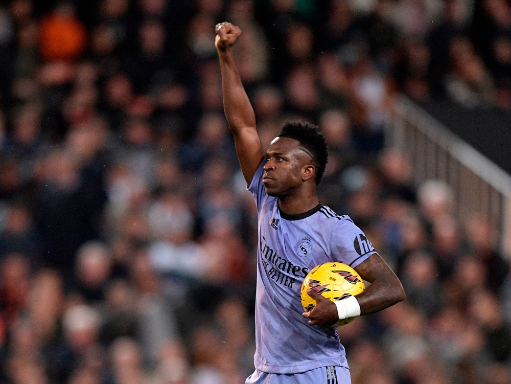 Real Madrid’s Vinicius Junior celebrates scoring their first goal against Valencia at Mestalla, Valencia, March 2, 2024.  Three Valencia fans were handed eight-month jail terms Monday for racist abuse towards Vinicius at a La Liga match last year that sparked international outrage, a court ruling showed. — Reuters pic