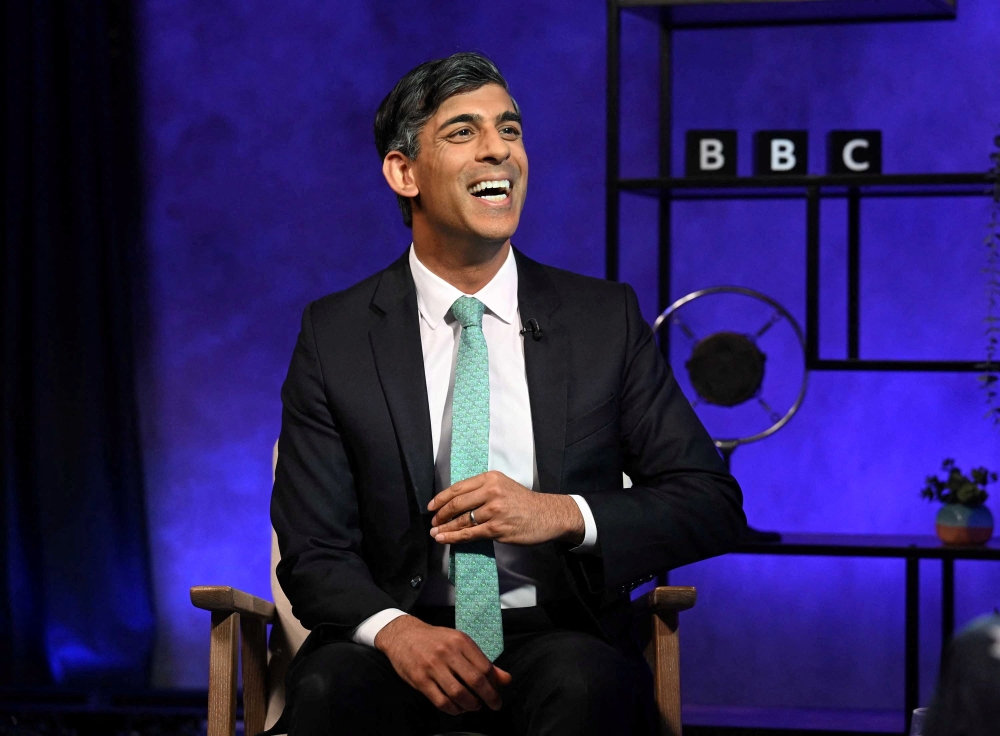 British Prime Minister Rishi Sunak reacts during an interview with Nick Robinson, in London June 10, 2024. — Handout by Jeff Overs/BBC via Reuters