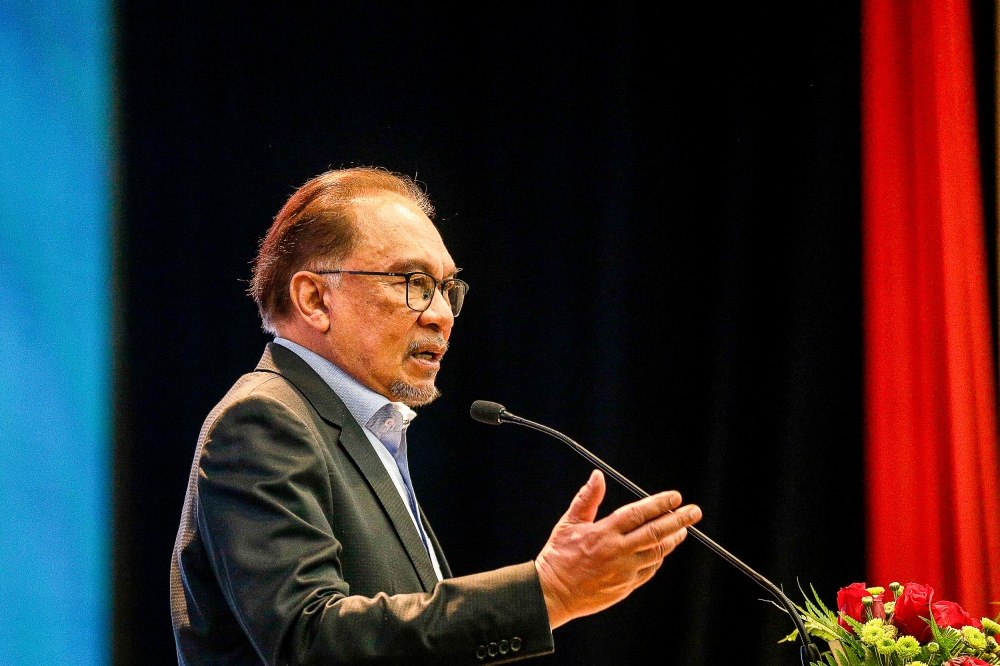 Prime Minister Datuk Seri Anwar Ibrahim speaks during the monthly assembly at the Finance Ministry in Putrajaya June 11, 2024. ― Picture by Sayuti Zainudin