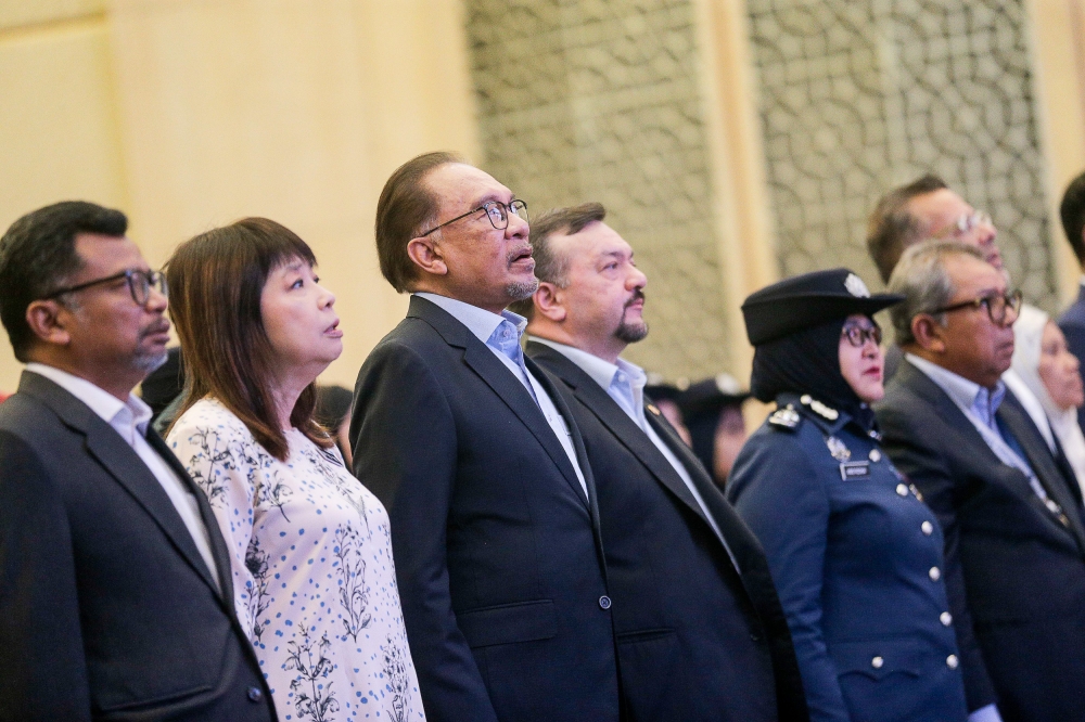 Finance Minister II Datuk Seri Amir Hamzah Azizan (fourth from left) said the Madani Economy framework, which outlines new strategies for Malaysia’s economic growth and identifies emerging growth industries, has yielded positive results, as demonstrated by the continued expansion of the economy. — Picture by Sayuti Zainudin