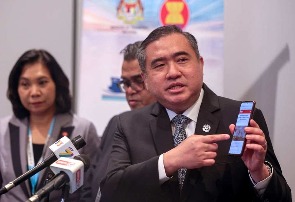 Transport Minister Anthony Loke speaks to reporters during a  press conference after opening the 57th Asean Senior Transport Officials Meeting in George Town June 11, 2024. — Bernama pic