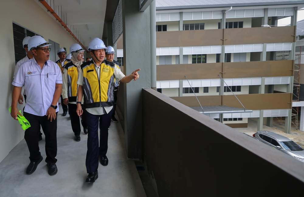 Deputy Works Minister Datuk Seri Ahmad Maslan visits the SK Jalan Haji Baki project in Padawan near Kuching, June 11, 2024. — Bernama pic 