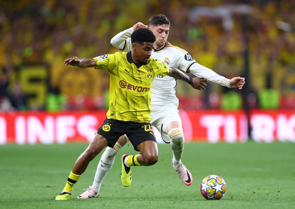 Borussia Dortmund’s Ian Maatsen in action with Real Madrid’s Federico Valverde at Wembley Stadium, London, June 1, 2024. — Reuters pic 