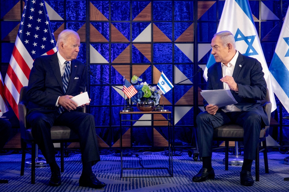US President Joe Biden meets with Israeli Prime Minister Benjamin Netanyahu to discuss the ongoing conflict between Israel and Hamas, in Tel Aviv, Israel in this file picture dated October 18, 2023. A recent survey by Washington-based Pew Research Center found that 84 per cent of Malaysian respondents disapproved of United States President Joe Biden’s handling of Israel’s recent aggression against Gaza. — Miriam Alster/Pool via Reuters file pic