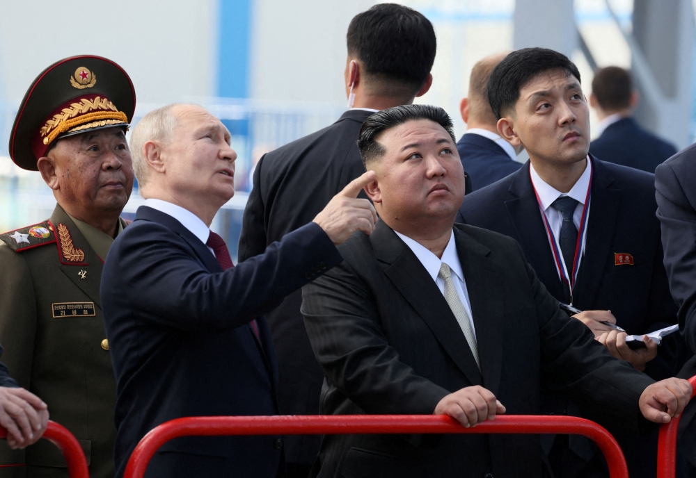 Russia's President Vladimir Putin and North Korea's leader Kim Jong Un visit the Vostochny ?osmodrome in the far eastern Amur region, Russia, September 13, 2023. — Sputnik/Mikhail Metzel/Kremlin via Reuters pic