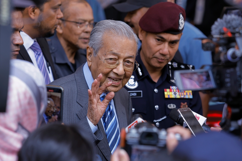 Tun Dr Mahathir Mohamad departs from the Legal Affairs Division of the Prime Minister’s Department in Putrajaya after testifying at the Batu Puteh RCI, June 12, 2024. — Bernama pic