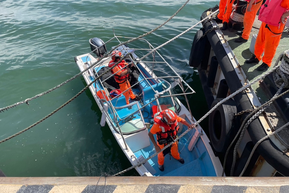 Taiwan’s coast guard picked up the man on Sunday after his vessel collided with other boats on the Tamsui River, which flows from the self-ruled island’s capital Taipei to its northern coast. — AFP pic/Taiwan Coast Guard