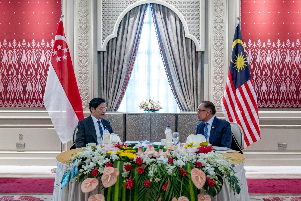 Prime Minister Datuk Seri Anwar Ibrahim said he spoke to Singapore Prime Minister Lawrence Wong regarding official issues that they had prepared beforehand but wanted to prove a point that personal relationships between both prime ministers were also important. — Picture by Sadiq Asyraf/Prime Minister’s Office of Malaysia