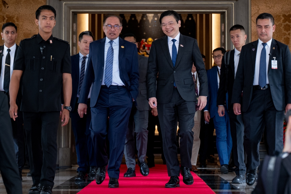 Prime Minister Datuk Seri Anwar Ibrahim and Singapore Prime Minister Lawrence Wong at Seri Perdana Complex in Putrajaya, June 12, 2024. — Picture by Sadiq Asyraf/Prime Minister’s Office of Malaysia