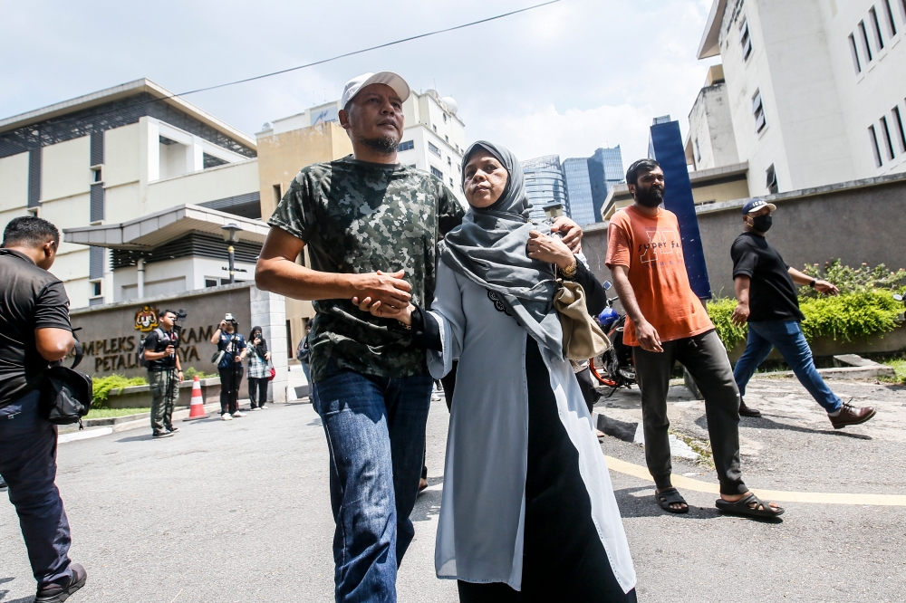 Zayn Rayyan Abdul Matiin’s grandparents pictured leaving the Petaling Jaya Court Complex, June 12, 2024. Police today detained the Zayn Rayyan’s grandparents, to assist in the investigation of his murder. — Picture by Hari Anggara