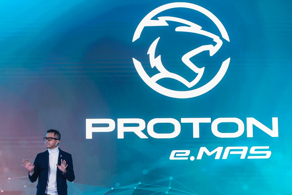 Proton chief designer Azlan Othman deliver his presentation during the launch of the new Proton EV Brand and Logo at the Proton Centre of Excellence Centre in Subang Jaya today. — Picture by Yusof Mat Isa