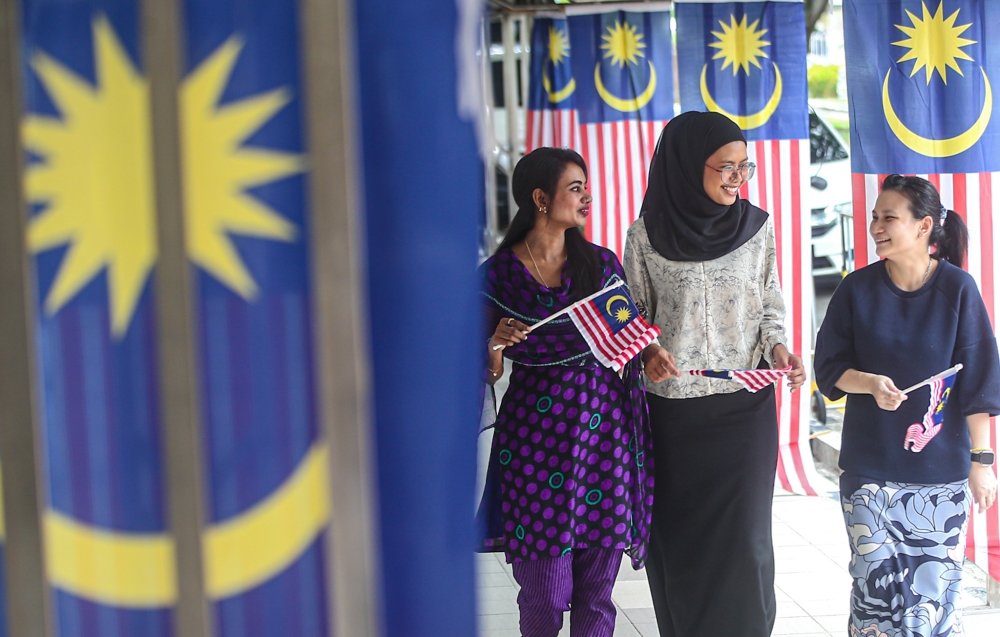 According to a report, there is just above average trust in the media among Malaysians mainly from the high-income group. — Picture by Farhan Najib