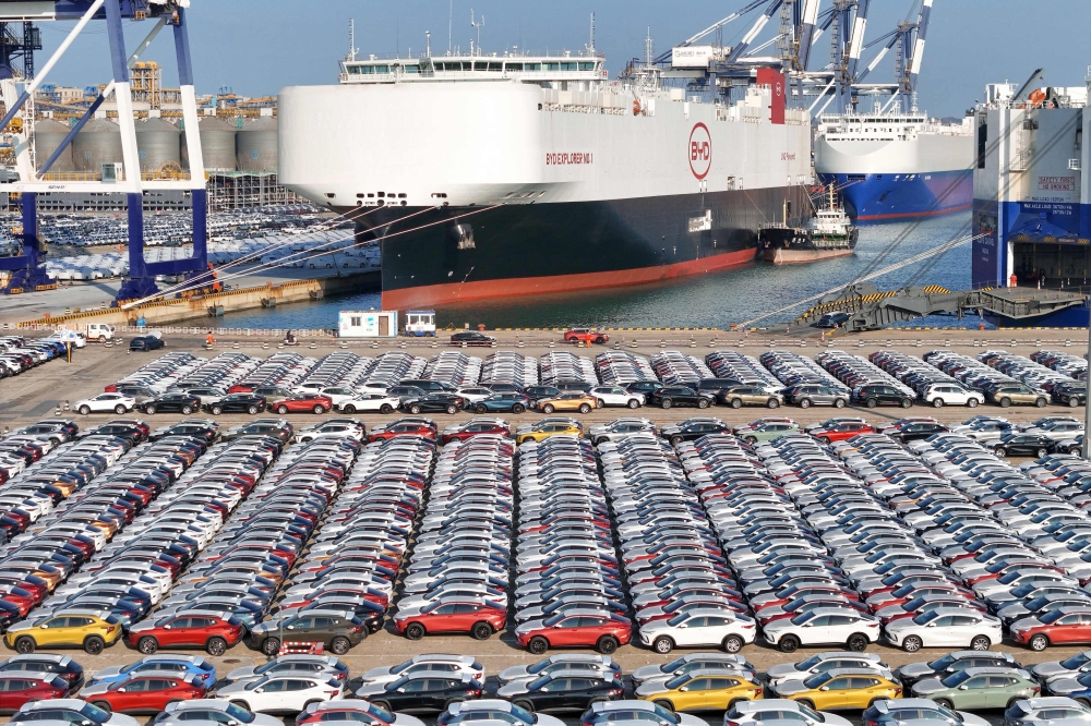 The photo taken on January 10, 2024 shows electric cars for export waiting to be loaded on the ‘BYD Explorer NO.1’, a domestically manufactured vessel intended to export Chinese automobiles, at Yantai port, in eastern China's Shandong province. The European Union said this week it would slap additional tariffs of up to 38 percent on Chinese electric car imports from next month after an anti-subsidy probe. — AFP pic