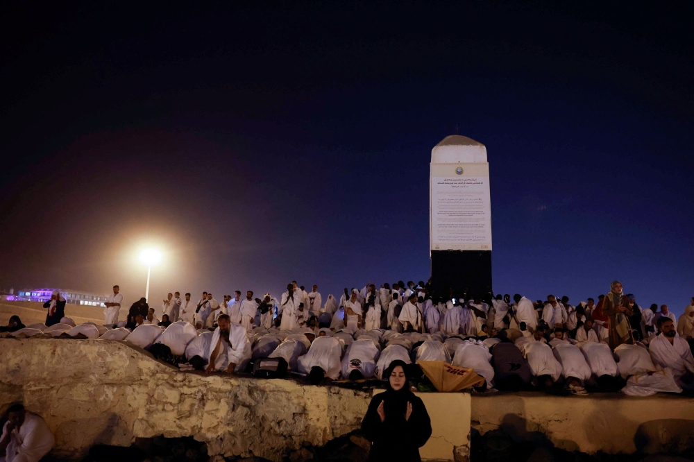 Muslim pilgrims gather at Mount of Mercy on the plain of Arafat during the annual Haj pilgrimage, outside the holy city of Mecca, Saudi Arabia, June 15, 2024. — Reuters pic