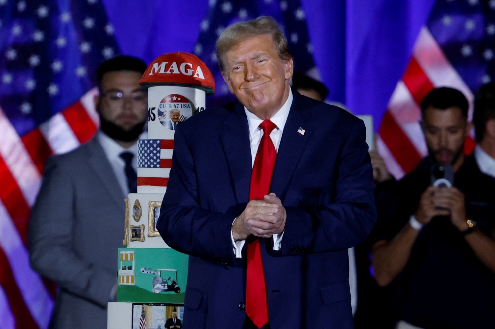 Former US President and Republican presidential candidate Donald Trump attends a rally and celebration of his birthday at the Palm Beach County Convention Centre, in West Palm Beach, Florida, US, June 14, 2024. — Reuters pic