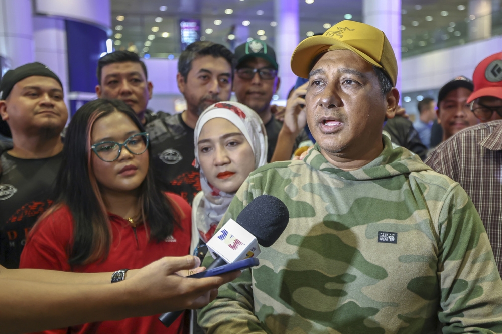 A participant of the expedition to climb Mount Denali, Alaska, Zainudin Lot meeting members of the media shortly after arriving at Kuala Lumpur International Airport (KLIA) Terminal 1 June 15, 2024. — Bernama pic