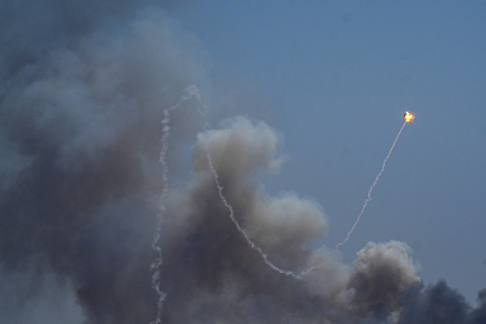 An interception of a rocket launched from Lebanon to Israel over the border. — Reuters pic