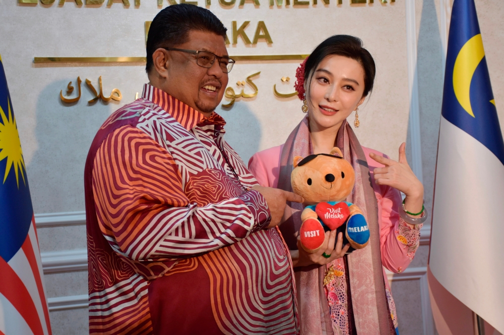 Melaka Chief Minister Ab Rauf Yusoh meets Chinese star Fan Bingbing who is the state's tourism ambassador, June 14, 2024. — Bernama pic 