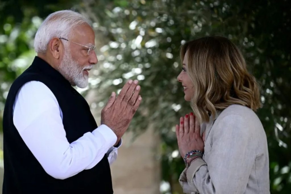 Indian Prime Minister Narendra Modi is welcomed by Italy’s Prime Minister Giorgia Meloni on June 14, 2024. — AFP pic