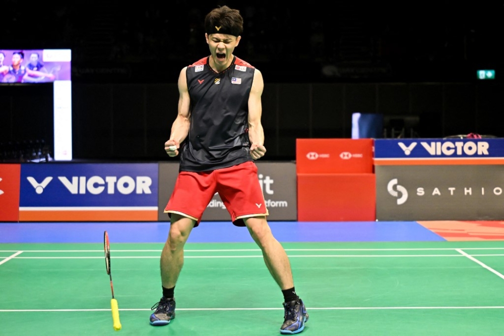 Malaysia’s Lee Zii Jia celebrates victory against Japan’s Kodai Naraoka in their men’s singles final match at the Australia Open badminton tournament in Sydney on June 16, 2024. — AFP pic