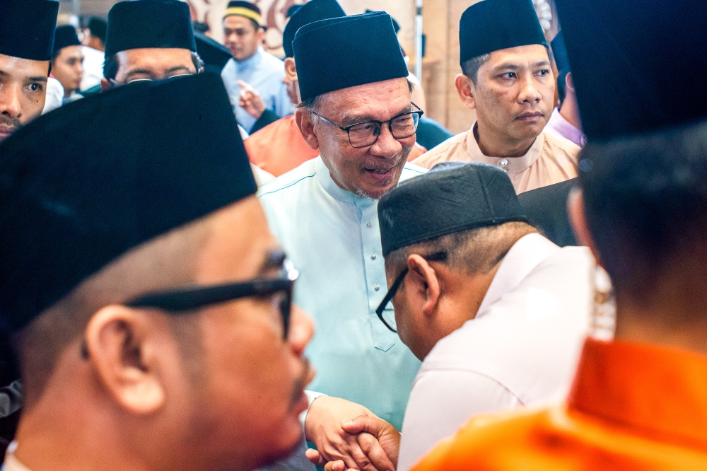 Prime Minister Datuk Seri Anwar Ibrahim arrives at the Putra Mosque in Putrajaya to perform Aidiladha prayers, June 17, 2024. — Picture by Shafwan Zaidon