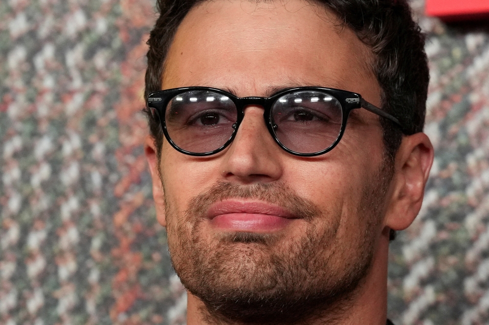 Theo James said his own family’s experience had 'given me an understanding of the sacrifices and struggles that refugees face'. — Reuters pic