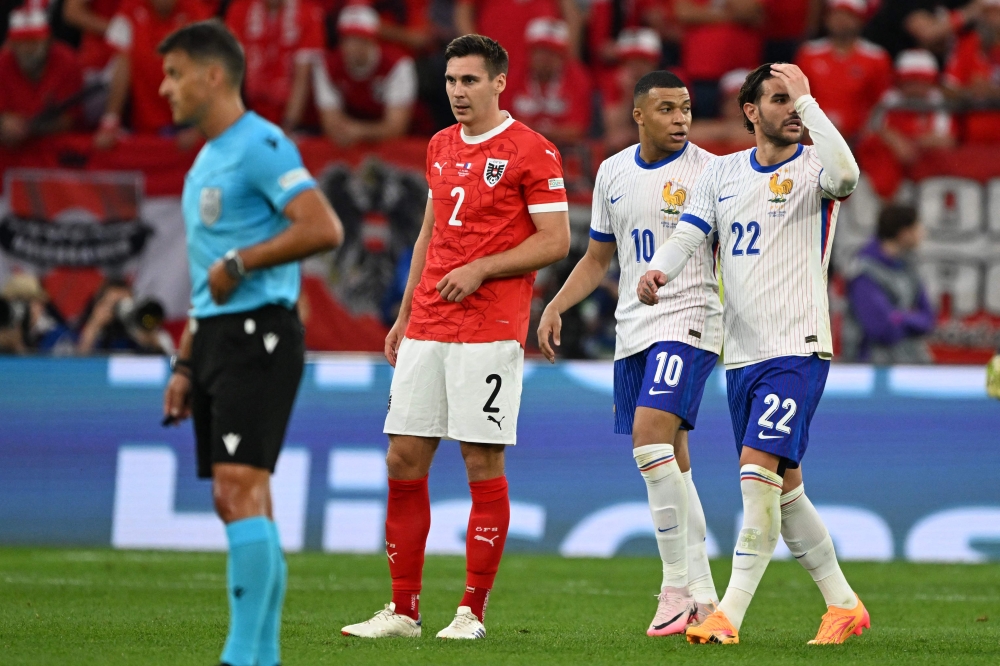 Austria's Maximilian Woeber reacts after conceding an own goal during the Euro 2024 Group D match against France Duesseldorf on June 17, 2024. ― AFP pic
