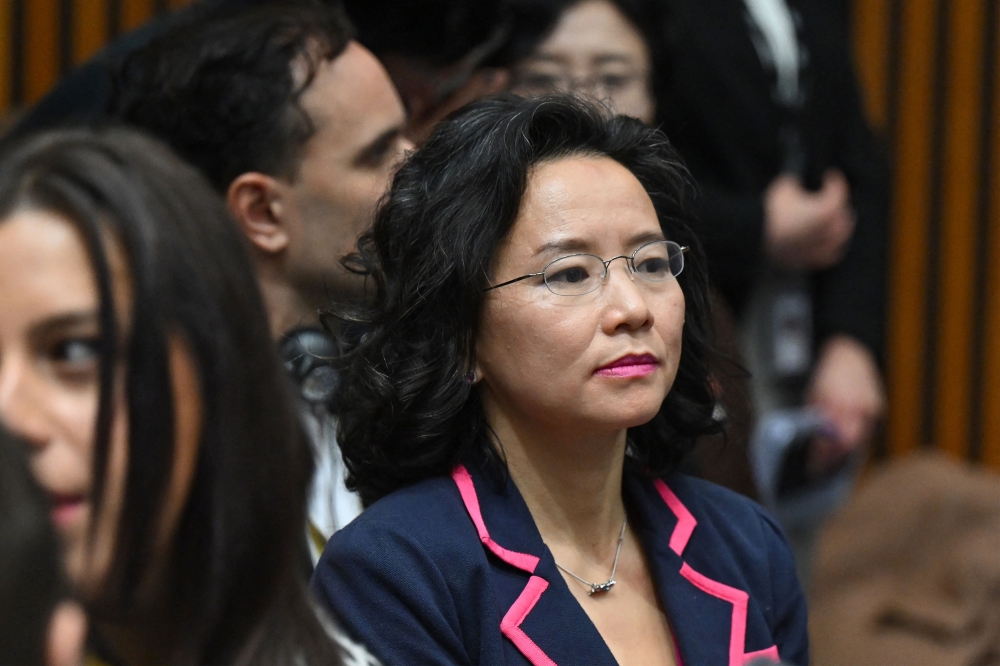 Australian journalist Cheng Lei observes a signing ceremony by China's Premier Li Qiang and Australia's Prime Minister Anthony Albanese at the Australian Parliament House in Canberra in Canberra June 17, 2024. ― AFP pic