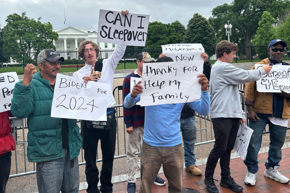 YouTube influencer Nick Shirley and Brandon Buckingham stage a protest with day laborers in front of the White House in Washington May 15, 2024. — Reuters pic