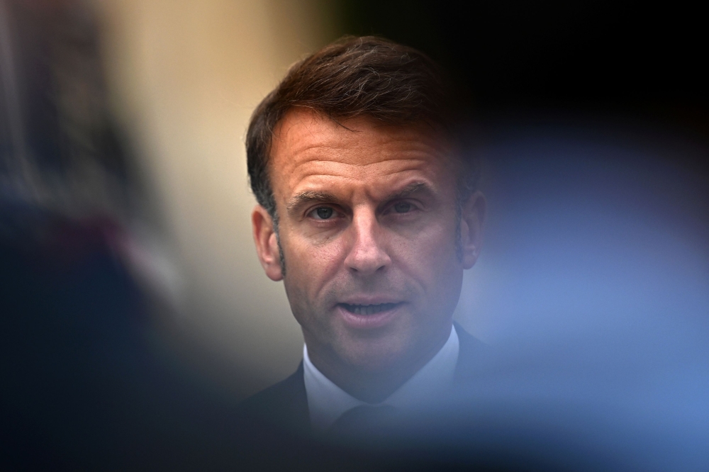 French President Emmanuel Macron today faced accusations of transphobia after lashing out at the snap election manifesto of a new left-wing coalition. — Reuters pic