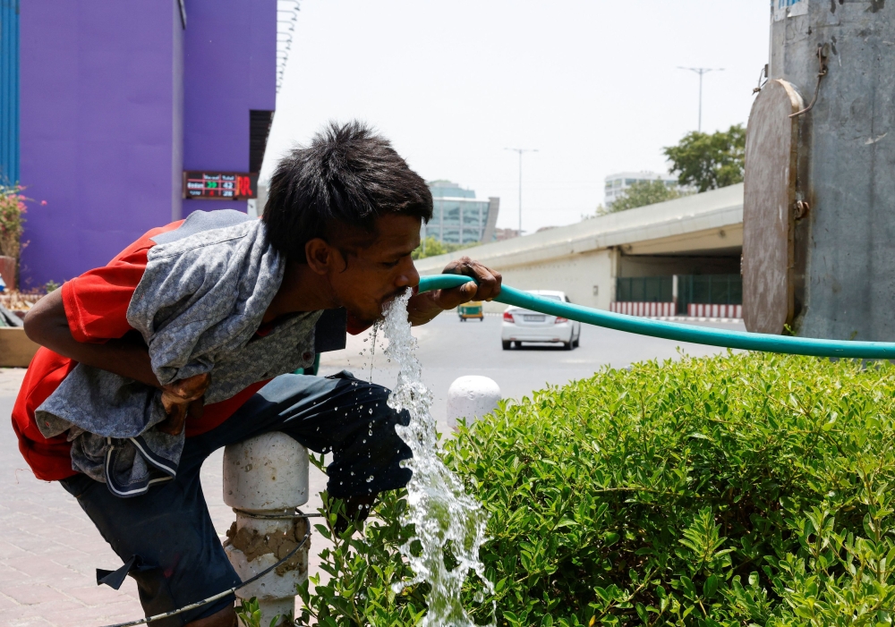 Billions across Asia are grappling with extreme heat this summer in a trend scientists say has been worsened by human-driven climate change, with temperatures in north India soaring to almost 50 degrees Celsius  in one of the longest heatwave spells recorded. — Reuters pic