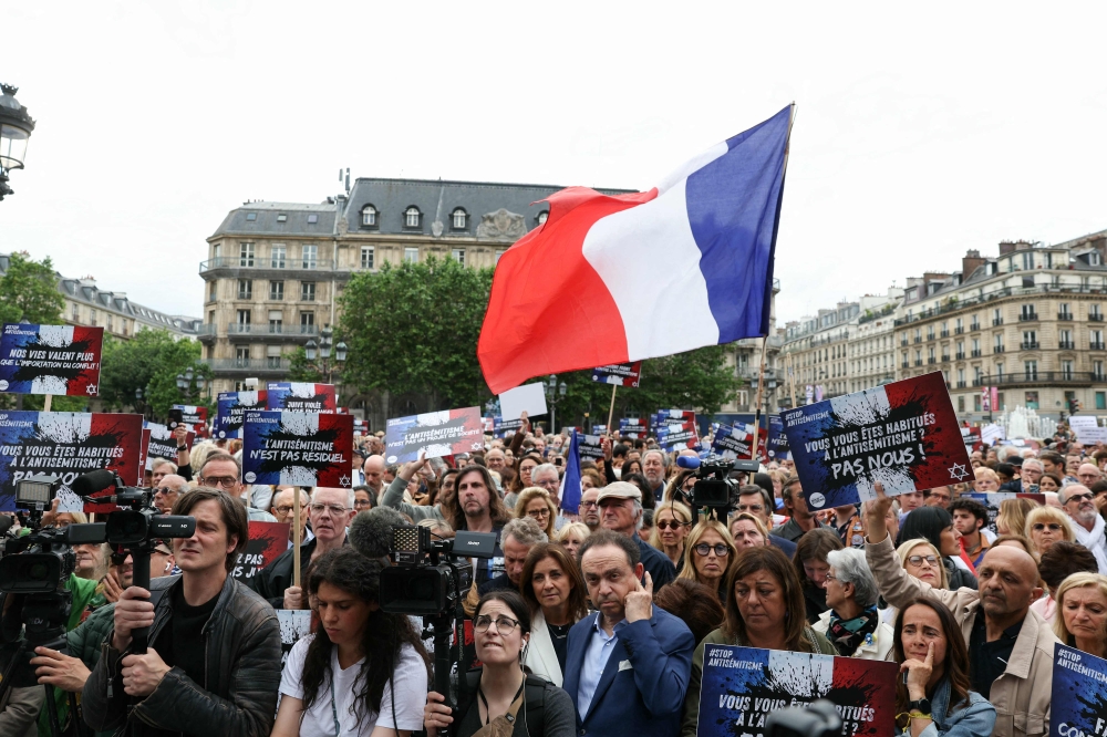 Hundreds took part in demonstrations against anti-Semitism in Paris and Lyon. — AFP pix