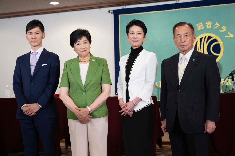 Candidates for the Tokyo Gubernatorial Election pose during a joint press conference at the Japan National Press Club in Tokyo on June 19, 2024. (From L-R): Former mayor of Akitakata city of Hiroshima prefecture Shinji Ishimaru, Tokyo Governor Yuriko Koike, member of the House of Councillors Renho, and former chief of the Japan Air Self-Defence Force Toshio Tamogami. — AFP pic